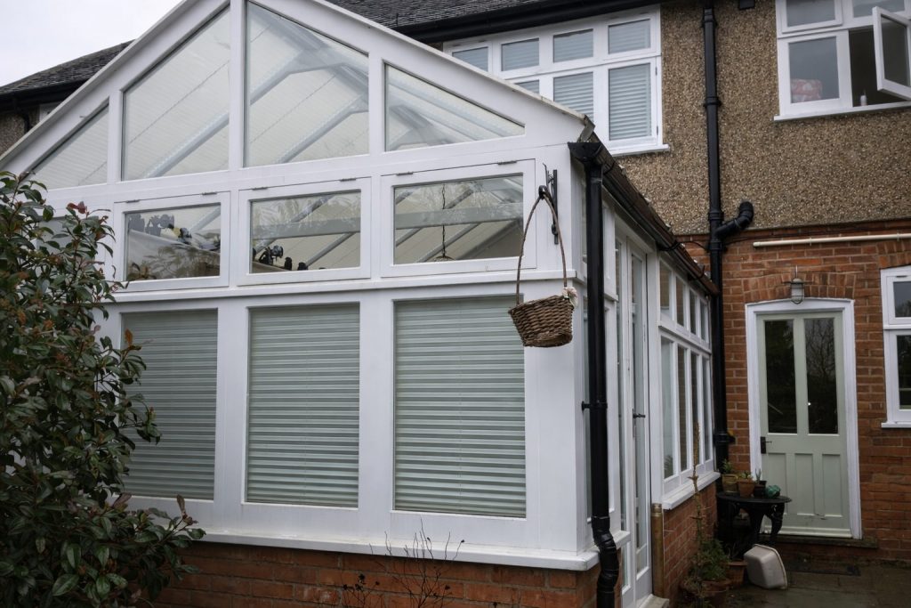 Bespoke white conservatory windows manufactured and fitted to a residential property in Essex